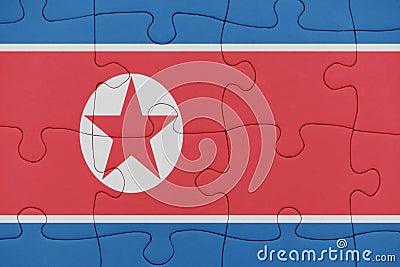 Puzzle with the national flag of north korea Stock Photo