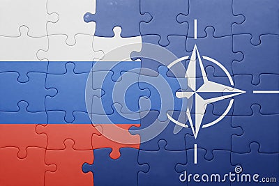 Puzzle with the national flag of russia and nato Editorial Stock Photo