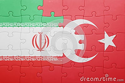 Puzzle with the national flag of turkey and iran Stock Photo