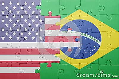 Puzzle with the national flag of united states of america and brazil Stock Photo