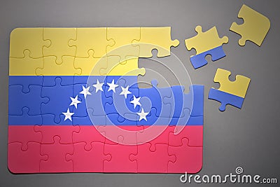 Puzzle with the national flag of venezuela Stock Photo