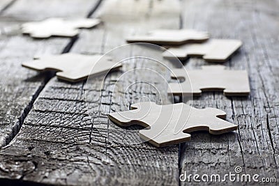 Puzzle on wooden boards team business concept Stock Photo