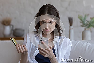 Puzzled confused shopper girl facing problems with online payments Stock Photo