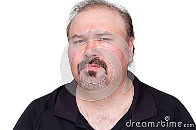 Puzzled middle-aged man with a goatee Stock Photo