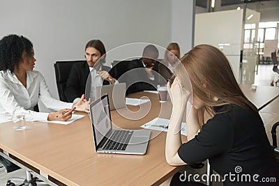 Puzzled serious businesswoman concerned about project statistics Stock Photo