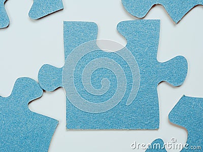Puzzles create a unique background, symbolizing unity and harmony, revealing deep semantic connections and emotions Stock Photo
