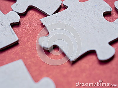 Puzzles create a unique background, symbolizing unity and harmony, revealing deep semantic connections and emotions Stock Photo