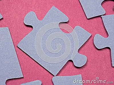 Puzzles create a unique background, symbolizing unity and harmony, revealing deep semantic connections and emotions Stock Photo