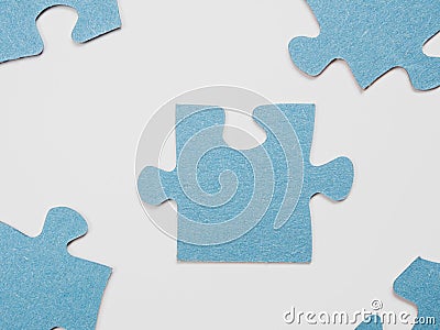 Puzzles create a unique background, symbolizing unity and harmony, revealing deep semantic connections and emotions Stock Photo