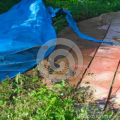 PVC foil and damaged tile Stock Photo