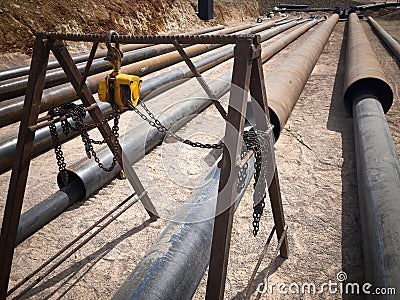 PVC pipes in protective metal covers Stock Photo