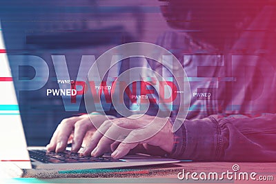Pwned computer, hacker using laptop to get power over devices connected to a network Stock Photo