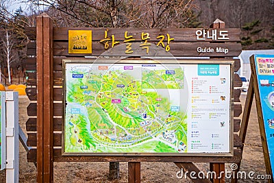 Pyeongchang,South Korea-March 2019: Wooden sign information board with map at Haneul Mokjang Farm Editorial Stock Photo