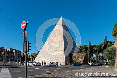 Pyramid of Cestius IN The Daylight with Cars Editorial Stock Photo