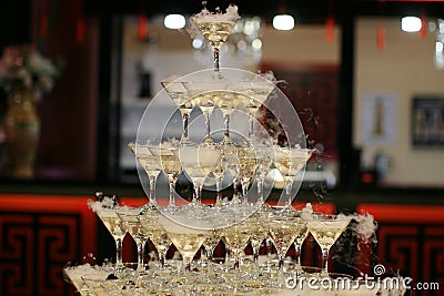 Pyramid of champagne glasses. In holliday Stock Photo