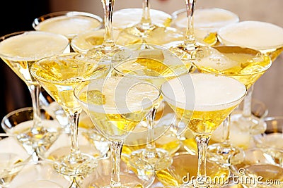 Pyramid of glasses with champagne close up Stock Photo