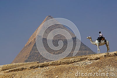 Pyramid of Khafre (Chephren) in Giza - Cairo, Egypt with a tourist police on a camel Editorial Stock Photo