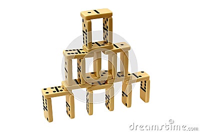 Pyramid made of domino tiles Stock Photo