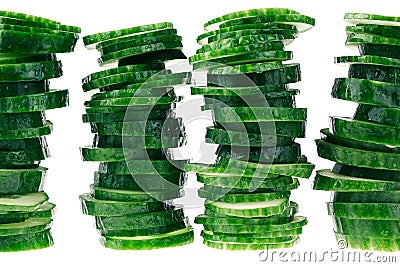 Pyramid from slices of cucumber. Frame with copy space. Concept art. Pattern. Stock Photo