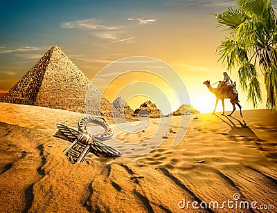 Pyramids and ankh in desert Stock Photo