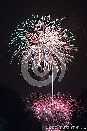 pyrotechnic show. fireworks in the night sky over the city. Stock Photo