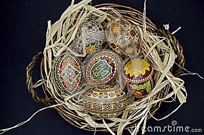 Pysanky Colorful Ukrainian Easter Eggs in a basket Stock Photo