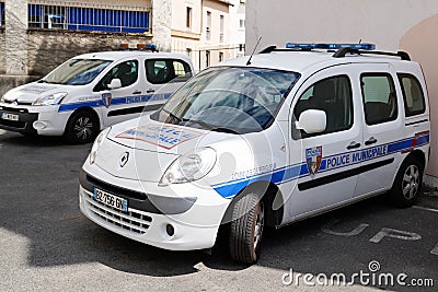 Two city car police municipale means in french Municipal police vehicle with sign Editorial Stock Photo