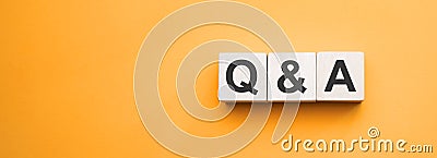 Q and A, questions and answers on wooden cubes. Concept Stock Photo