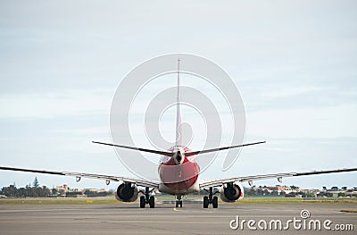 Qantas plane approaching runway at Adelaide Airport Editorial Stock Photo