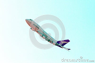 Qantas Plane flies over Grandprix Editorial Stock Photo