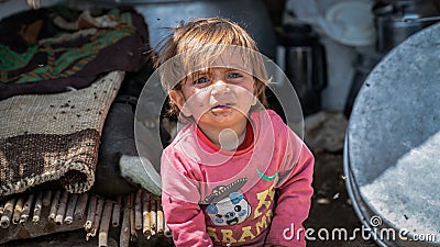 Qashqai Turkish nomadic child crying inside a tent, Shiraz, Iran Editorial Stock Photo