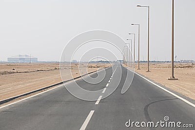 Qatar - Al-khor Road, Vanishing into the Desert Stock Photo