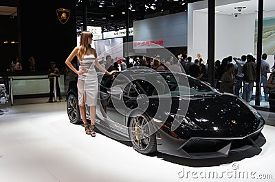 Qatar Motorshow 2011 - Woman Lamborghini Stand Editorial Stock Photo