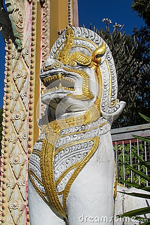 Qilin asian mythological guard statue in Thai temple Editorial Stock Photo