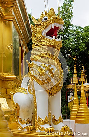 Qilin asian mythological guard statue in Thai temple Editorial Stock Photo