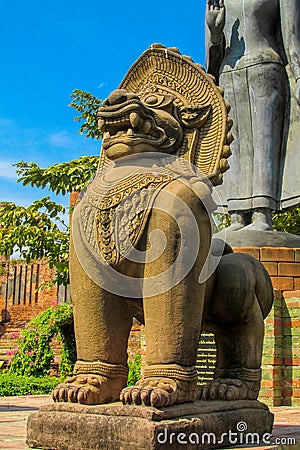 Qilin asian mythological guard statue in Thai temple Stock Photo