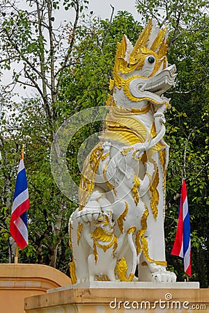 Qilin asian mythological guard statue in Thailand wat Stock Photo