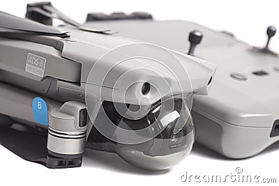 Quadcopter drone aerial camera whit remote control isolated on white background Stock Photo