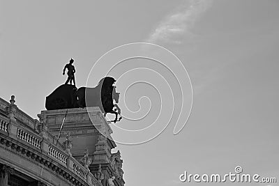 Quadriga statue on the roof of a building in Madrid Editorial Stock Photo