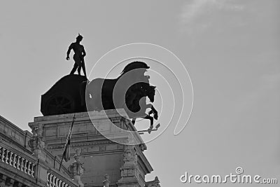 Quadriga statue on the roof of a building in Madrid Editorial Stock Photo