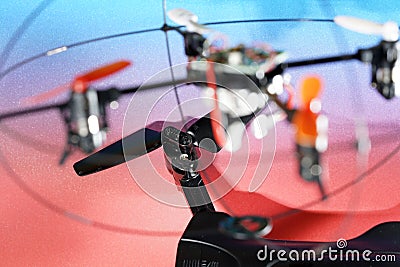 Quadrocopter also called drone photographed in the studio and faked flight Stock Photo