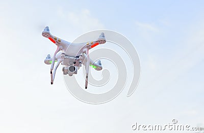 Quadrocopter drone with the camera . Stock Photo