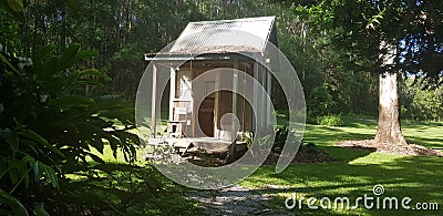 Quaint cabin in the woods Stock Photo