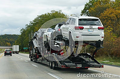 Quakertown, Pennsylvania, U.S - October 21, 2023 - A truck carrying cars and SUV moving on Route 81 Editorial Stock Photo