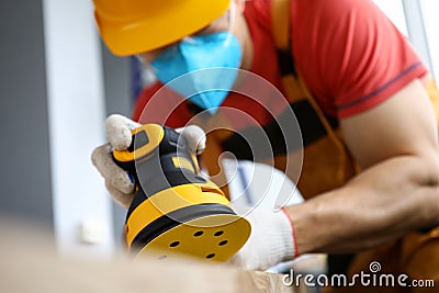 Qualified repairman using instrument Stock Photo