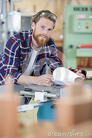 qualified workman in industrial workshop Stock Photo