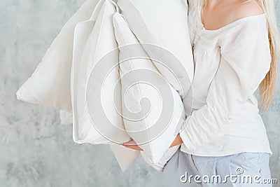 Quality bedding sound sleep woman hold pillows Stock Photo