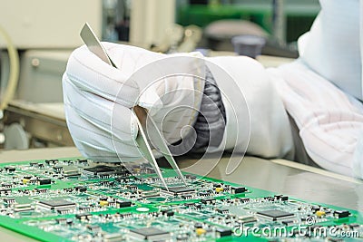 Quality control and assembly SMT printed components on PCB Stock Photo