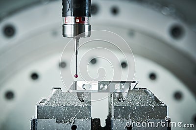 Quality control on milling CNC machine. Precision probe sensor at industrial metalworking Stock Photo