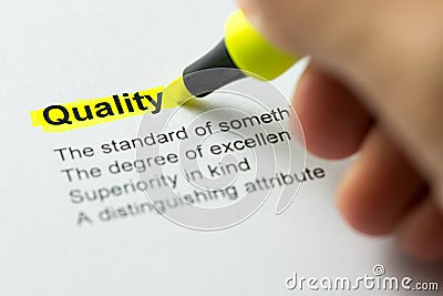 Quality highlighted in yellow Stock Photo